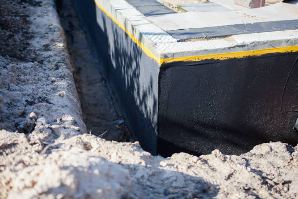 Professional Waterproofing technician working in Pleasant Hill, TN